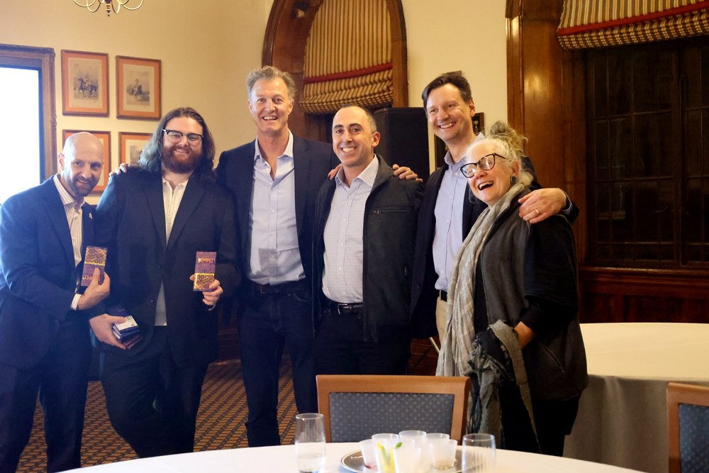 Carl with members and guests in one of the Club's dining rooms